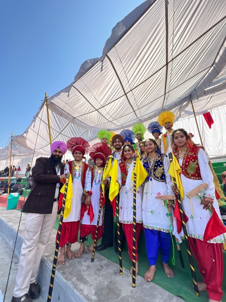 School of Eminence, Kiratpur Sahib's Bhangra team in-charge teacher Gursewak Singh and Bhangra coach Davinder Singh